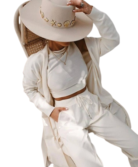 201233296_392644135405934_8049725712402571825_n-removebg-preview woman relaxing in a chair wearing cream matching loungewear and a hat